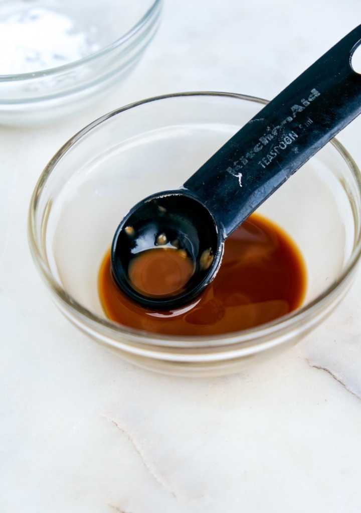 Soy sauce and corn starch mixed in a small condiment bowl. 