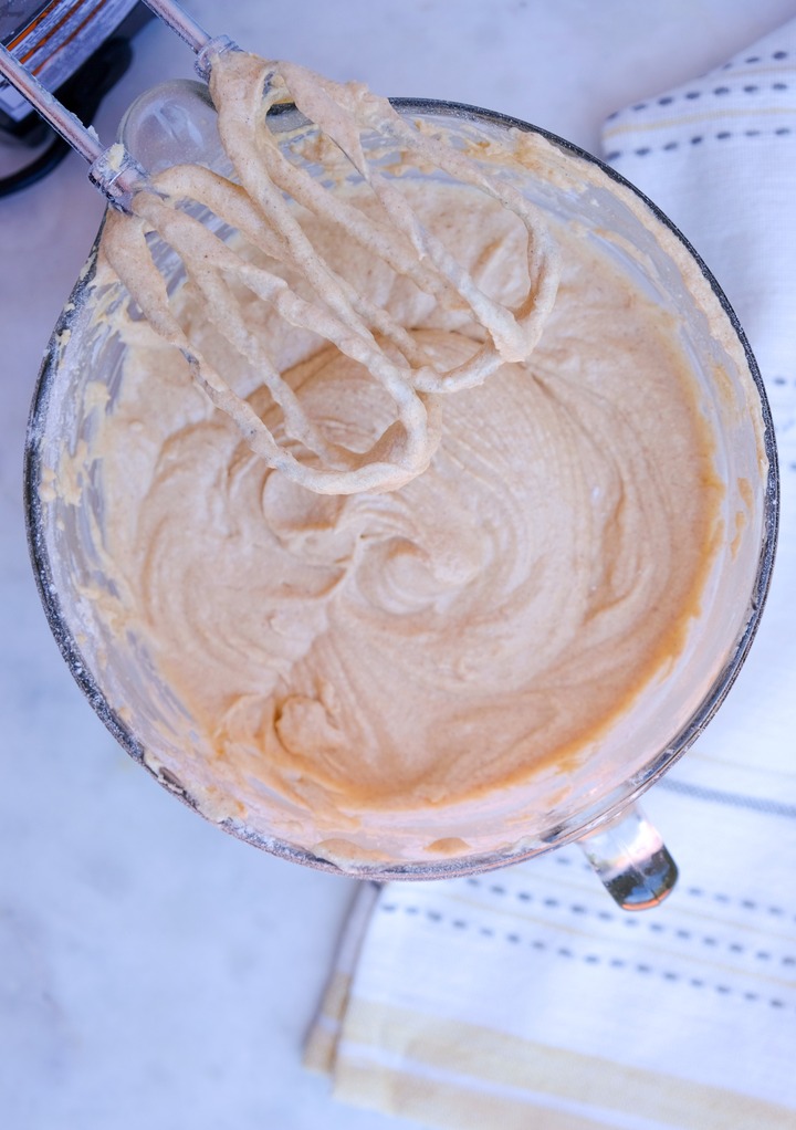 Wet ingredients for churro cupcakes in a mixing bowl. 