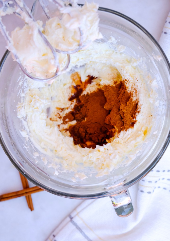 Cream cheese and ingredients to make cinnamon frosting. 