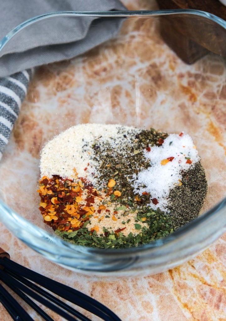 Dry spices in a small mixing bowl before whisking together. 