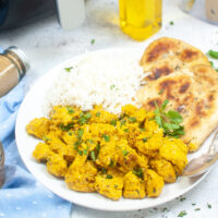 Curry chicken dinner dish with rice.