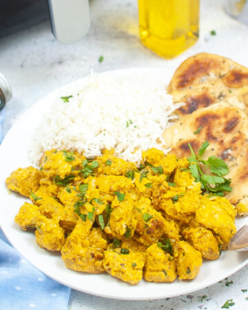 Curry chicken dinner dish with rice.