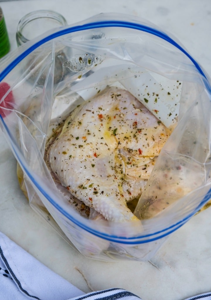 Marinating chicken in a Ziplock bag. 