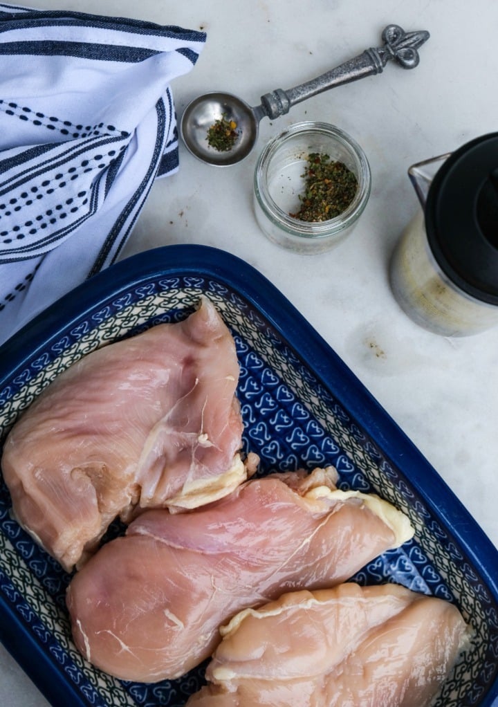 Ingredients to make baked chicken in Italian dressing. 