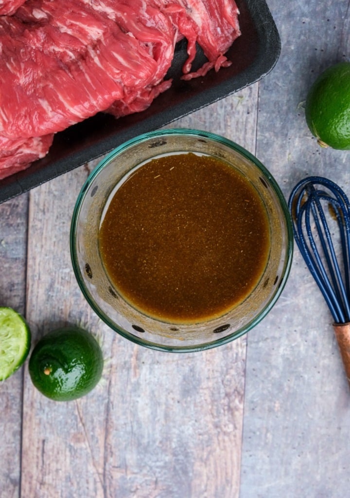 Marinade in a small pyrex mixing bowl. 