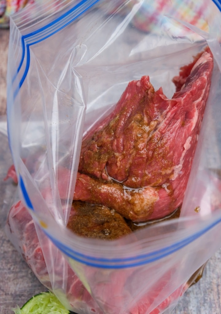 Marinade with steak in a ziplock bag.