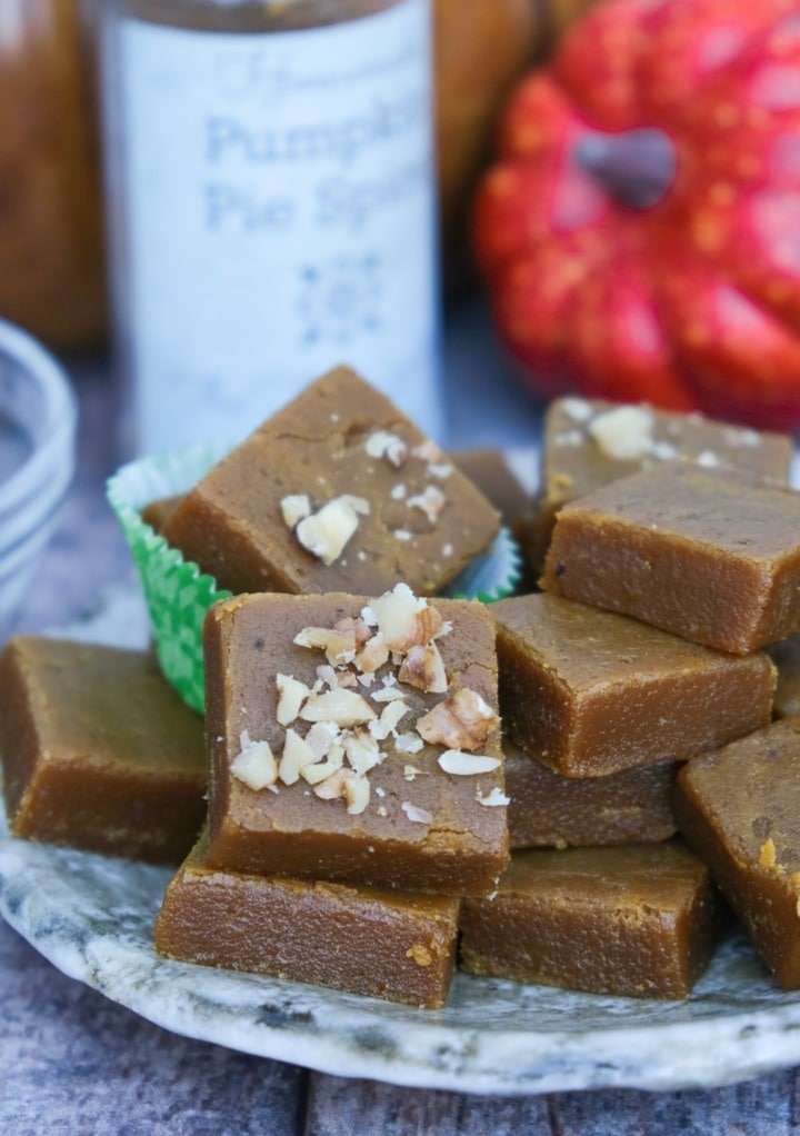 A small plate topped with homemade pumpkin fudge.