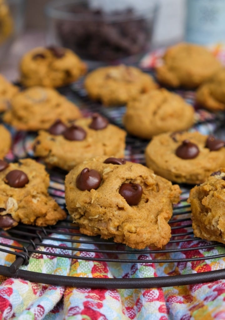 Homemade gluten free pumpkin oatmeal cookies on a cooling rack. 