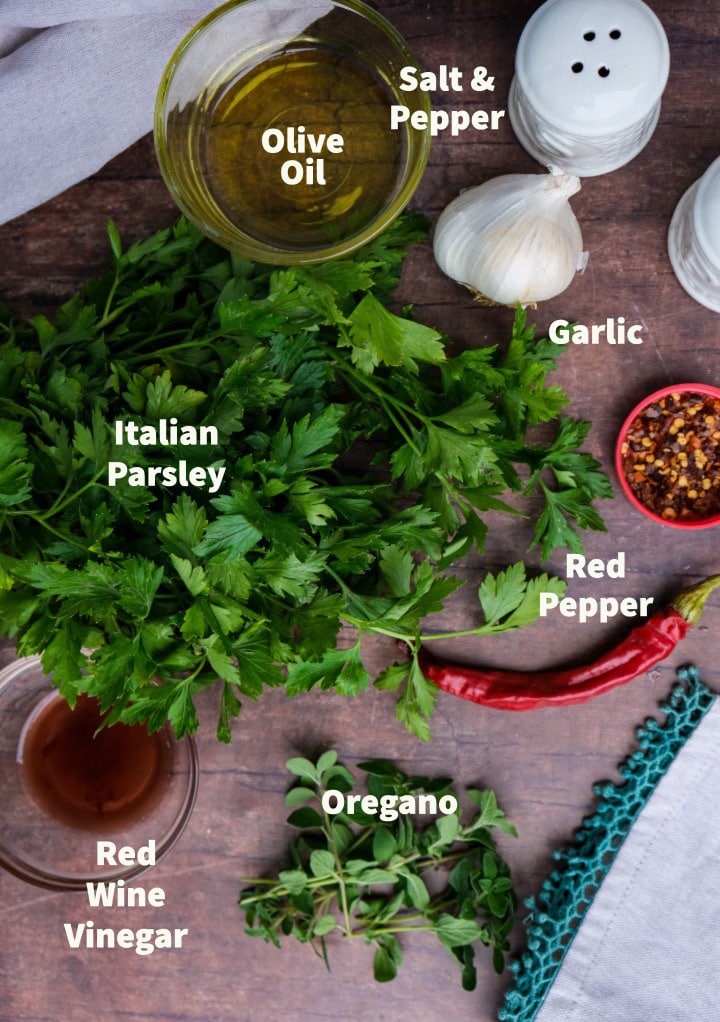Top view of ingredients to make spicy chimichurri sauce. 