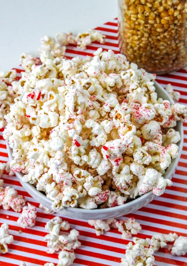 Top view of peppermint popcorn in a white serving bowl ready to enjoy.