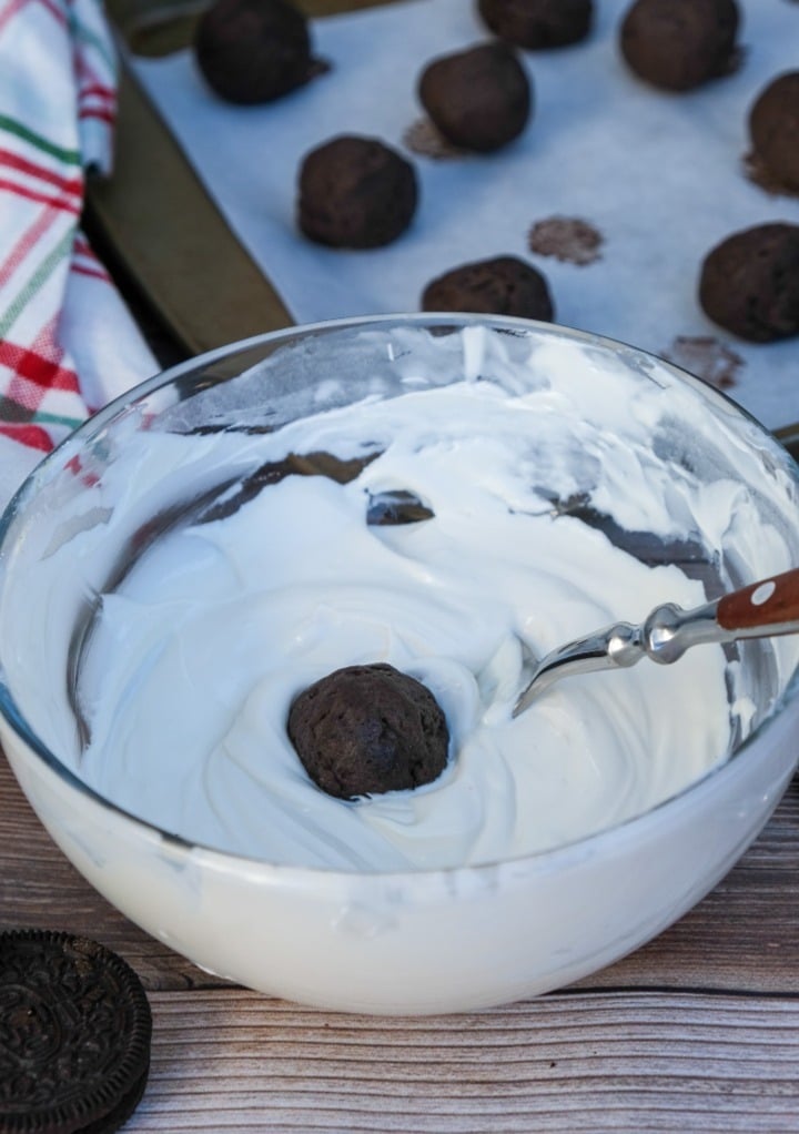 Oreo balls dipped in melted white chocolate.