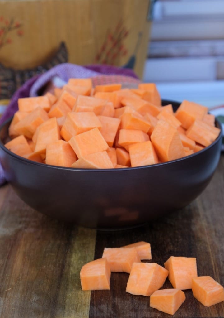 Diced sweet potatoes in a bowl before cooking. 