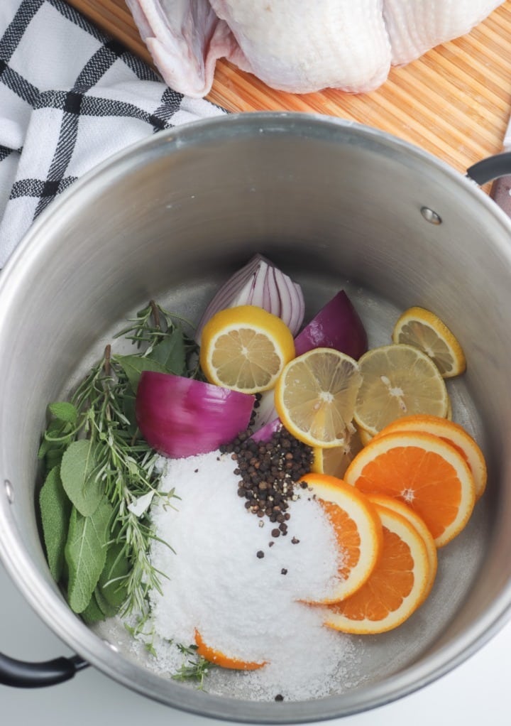 Ingredients to brine a turkey in a stockpot.