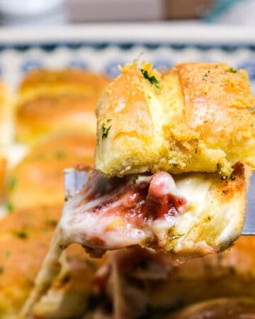 Turkey sliders with leftover turkey and cranberry sauce baked in the oven.
