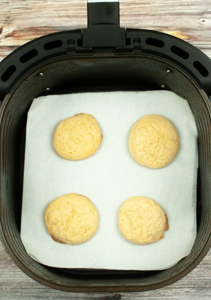 Cookies in the basket of the air fryer.