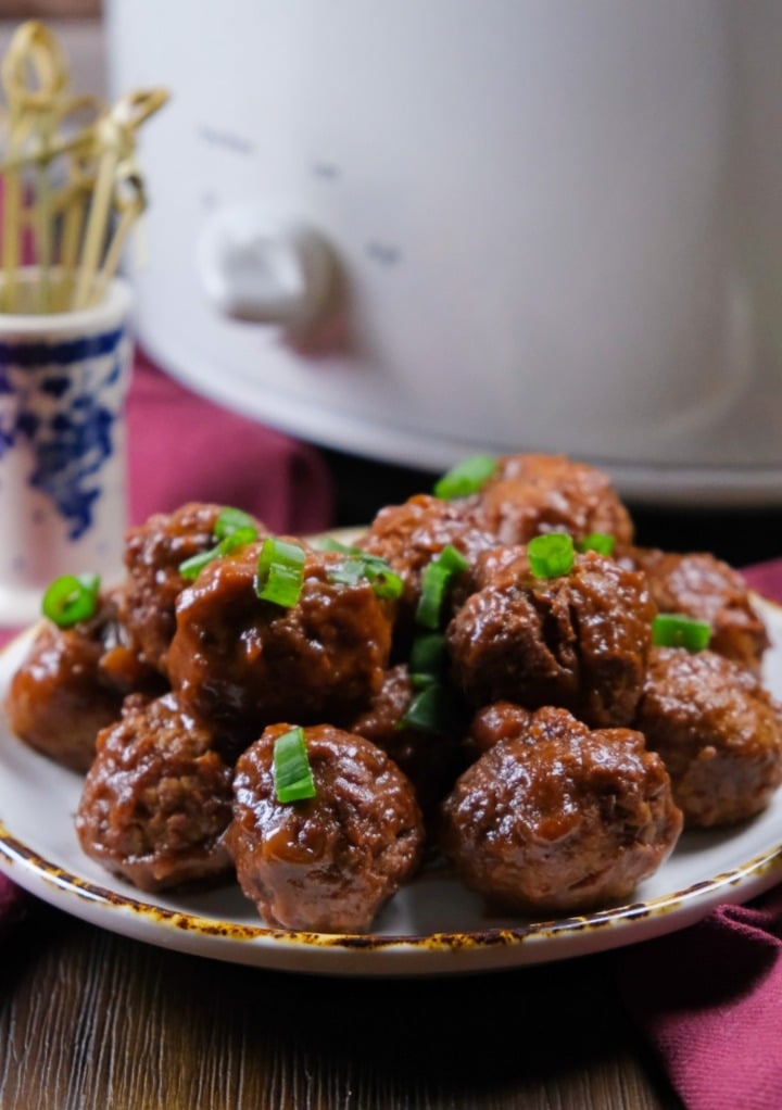 3 ingredient cranberry meatball recipe cooked in a slow cooker. 