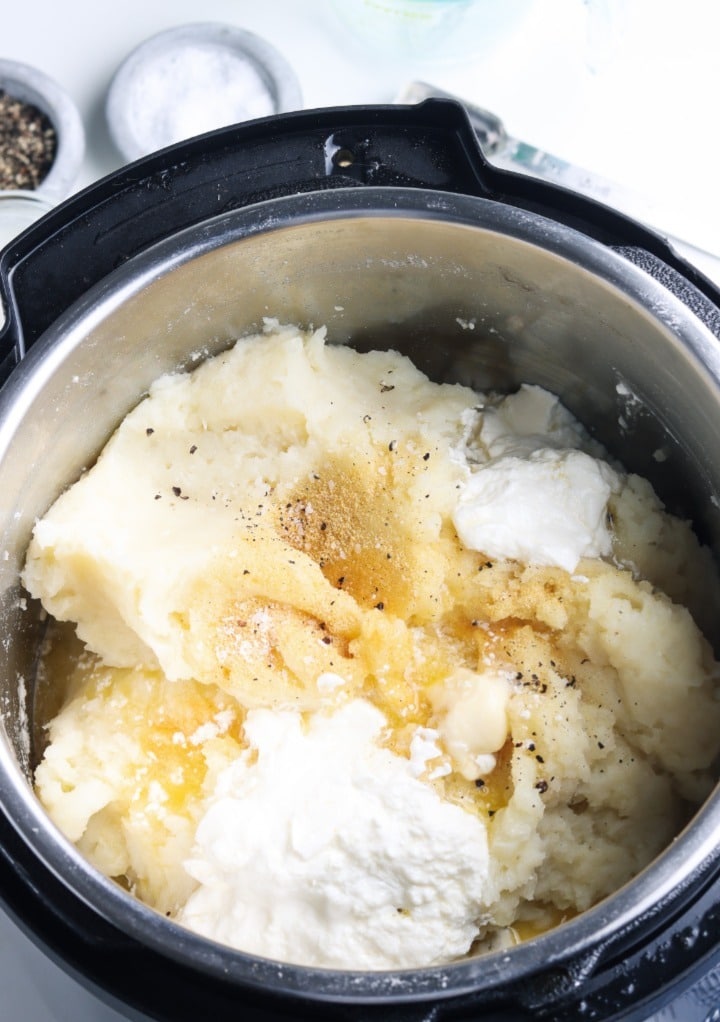 Sour cream and additional ingredients added to mashed potatoes. 