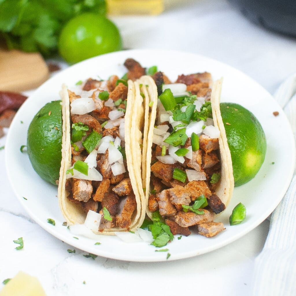 Spicy pork tacos cooked in an air fryer.