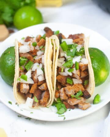 Spicy pork tacos cooked in an air fryer.