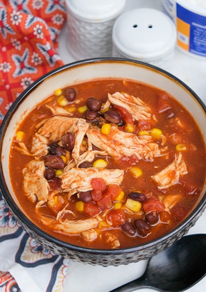 Top view of a bowl filled chicken taco soup.