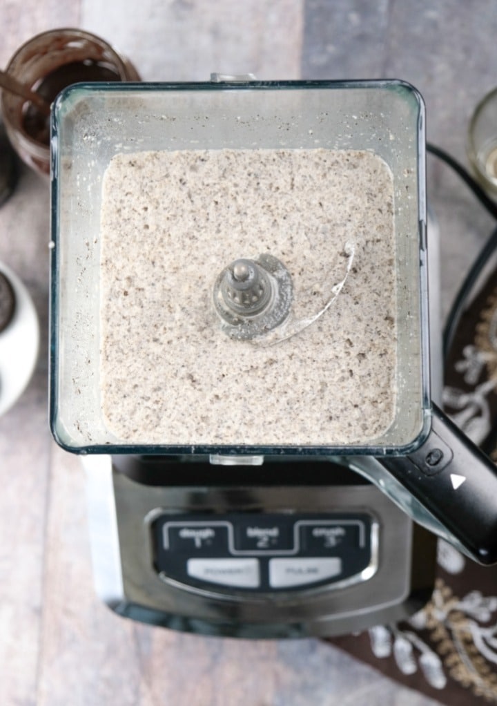 Ingredients for a mocha cookie crumble frappuccino blended before pouring in cups.