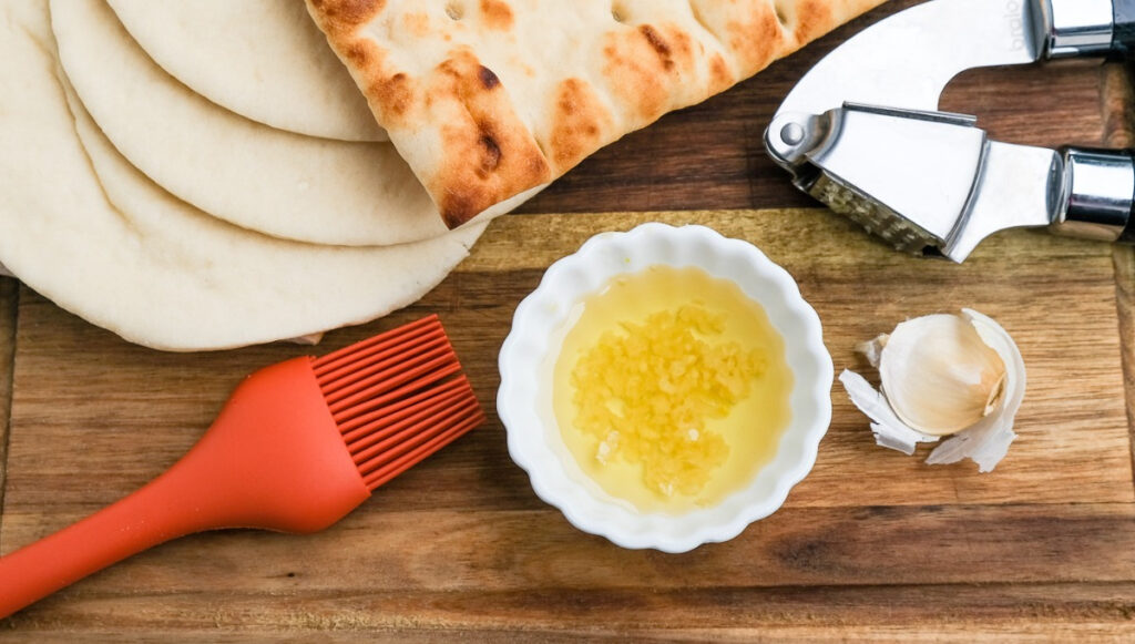 Minced garlic in a small bowl with olive oil. 