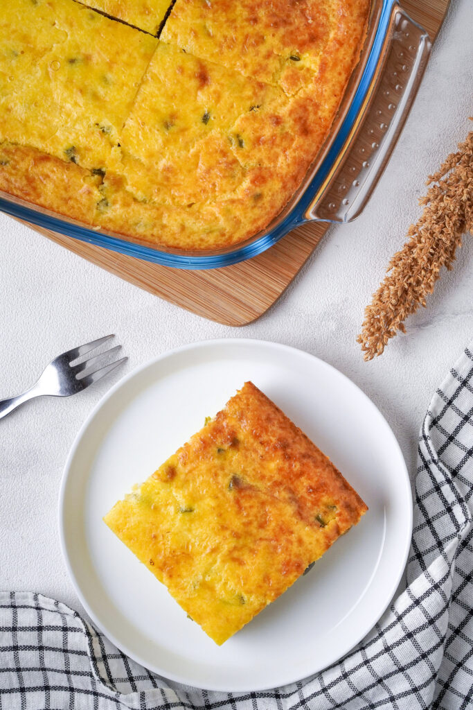 Top view of egg casserole dish with green chiles. 