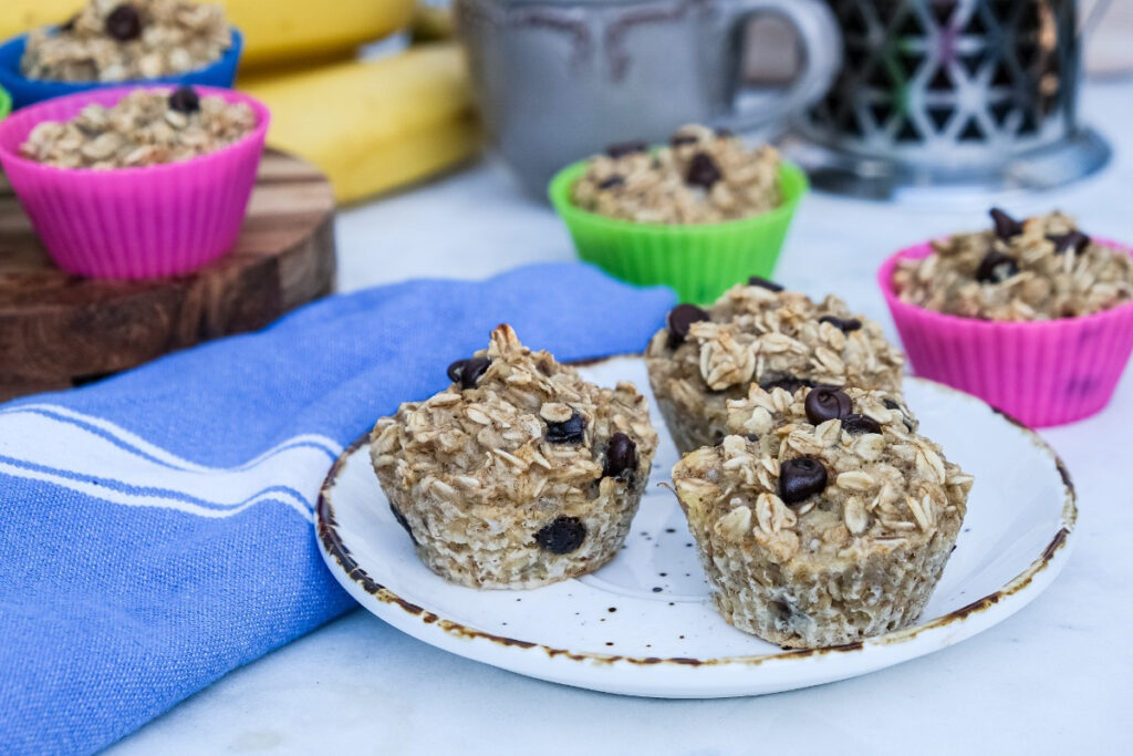 Healthy oatmeal muffin cups on a white serving plate ready to eat. 