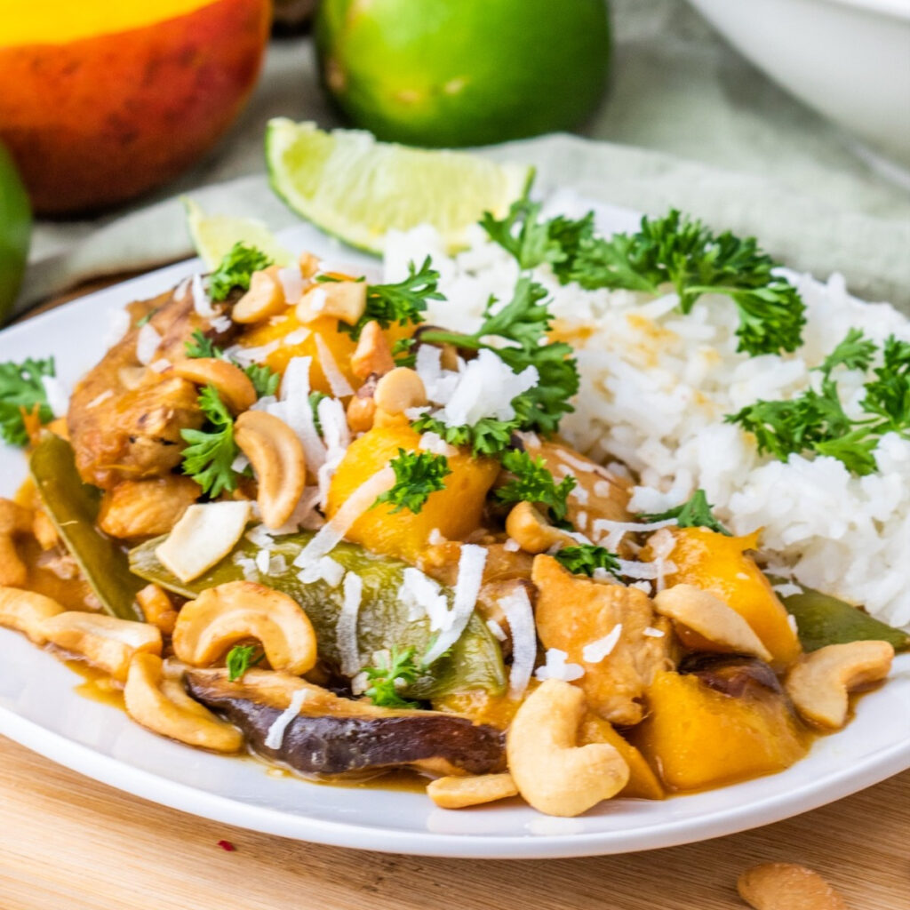 Thai coconut lime chicken with fluffy rice on the side ready to eat.