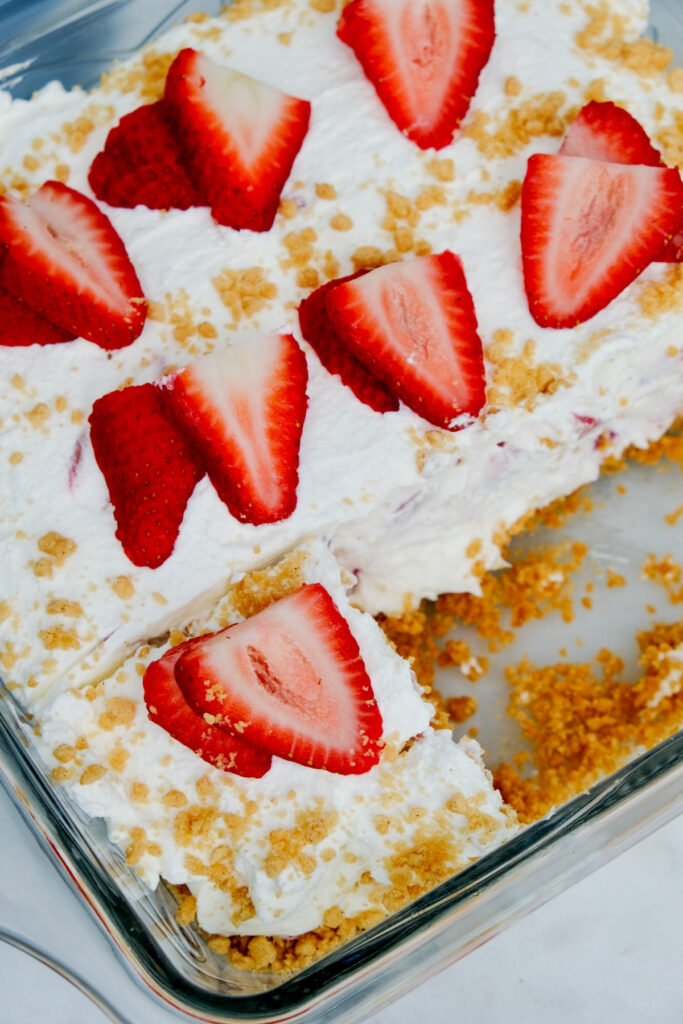 Top view of a whole icebox cake with a slice cut out. 