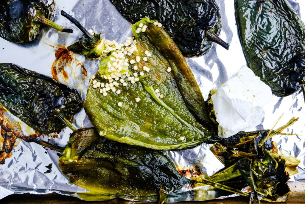 Poblano peppers sliced and exposing the seeds. 