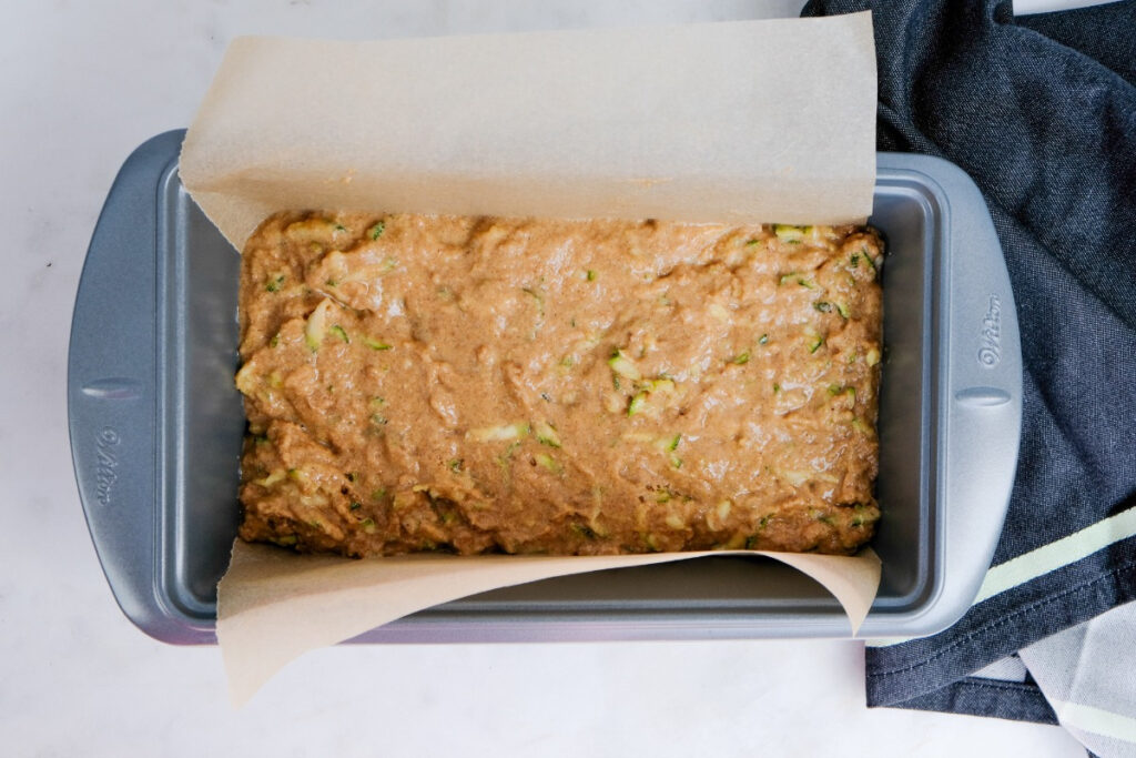 Unbaked bread in a loaf pan before baking. 