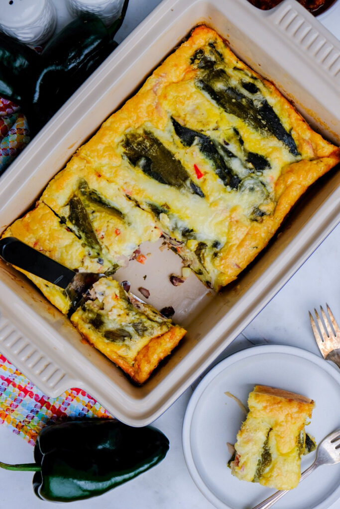 Top view of stuffed poblano chile relleno casserole dish. 