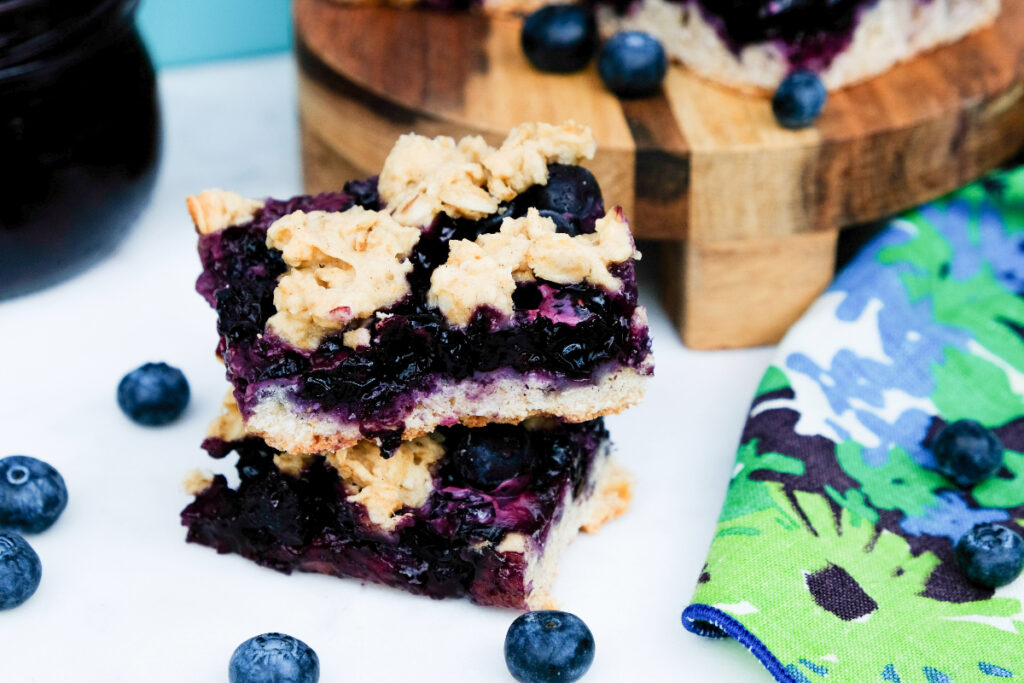 Crumble bars with fresh blueberries on the side. 