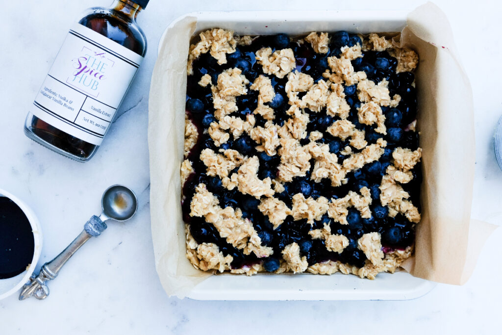 Crumble topping over blueberry mix before baking. 