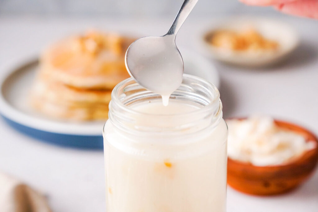 Coconut syrup in a clear mason jar. 