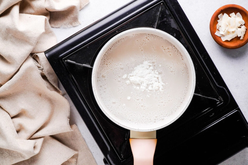 coconut milk and sugar in a saucepan.