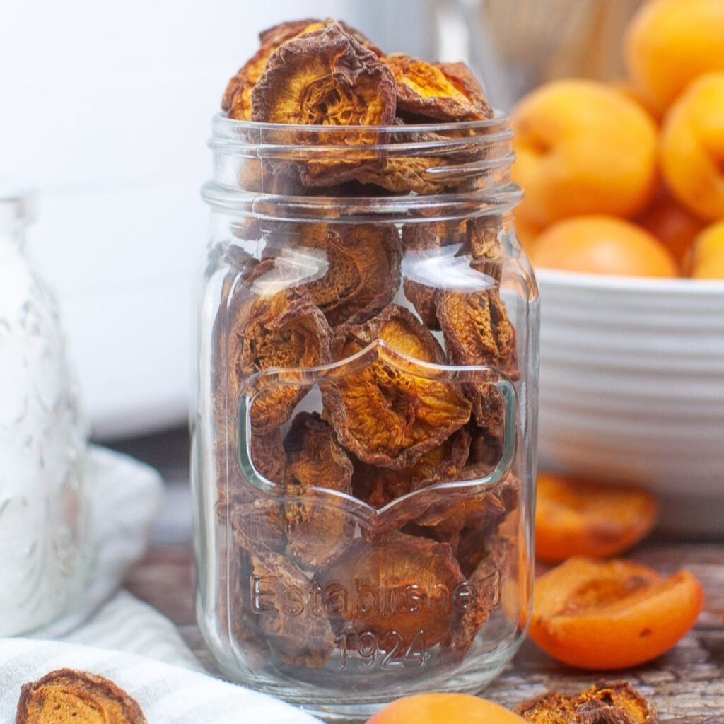 Dehydrated apricots in a jar ready to eat.