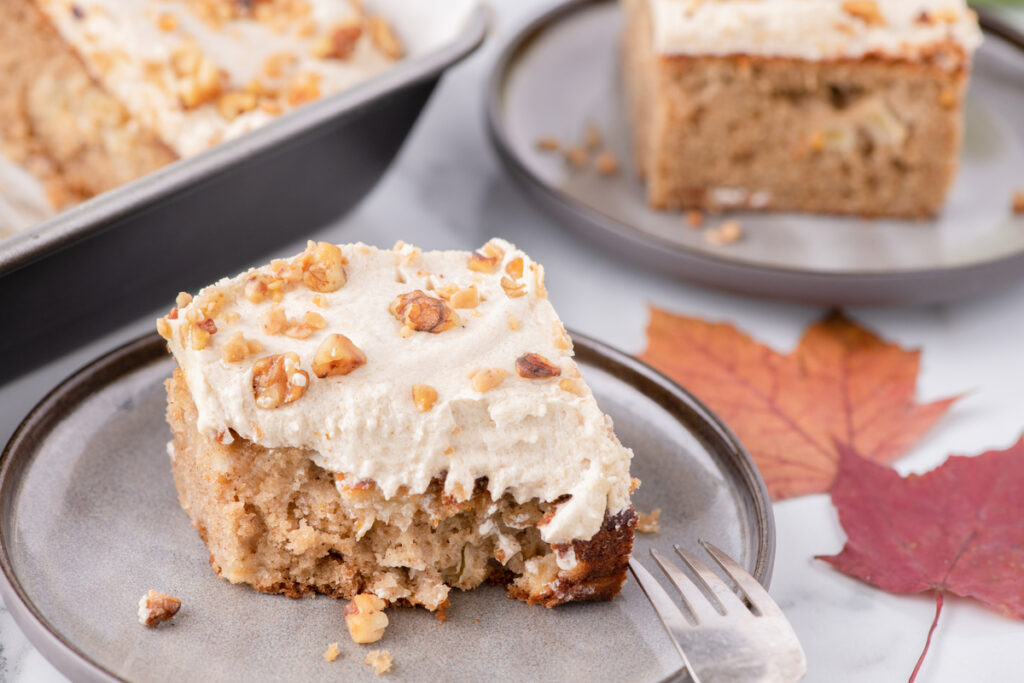 Apple spice cake on gray plates ready to enjoy. 