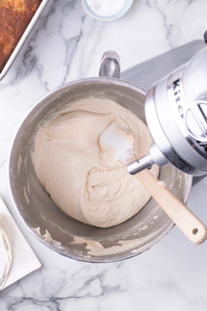 Buttercream frosting in a KitchenAid mixer. 