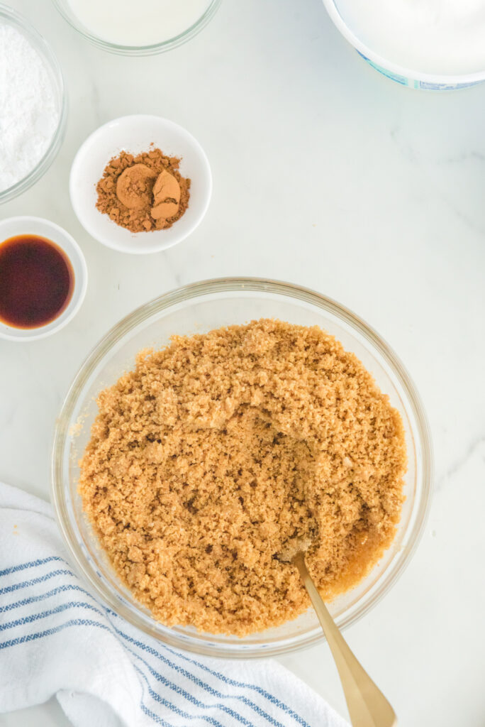 Graham cracker crumbs in a mixing bowl to make a crust.