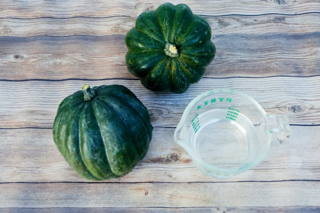 Acorn squash and water to cook in an Instant Pot.