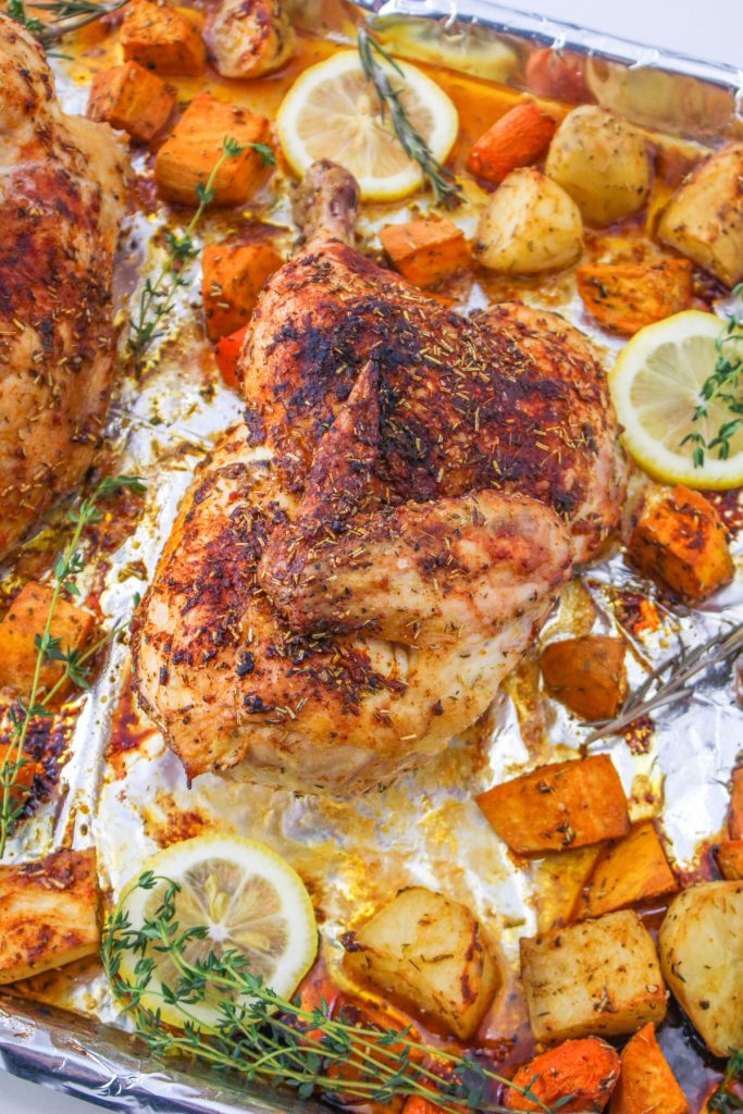 Sheet pan roasted half chicken with vegetables. 