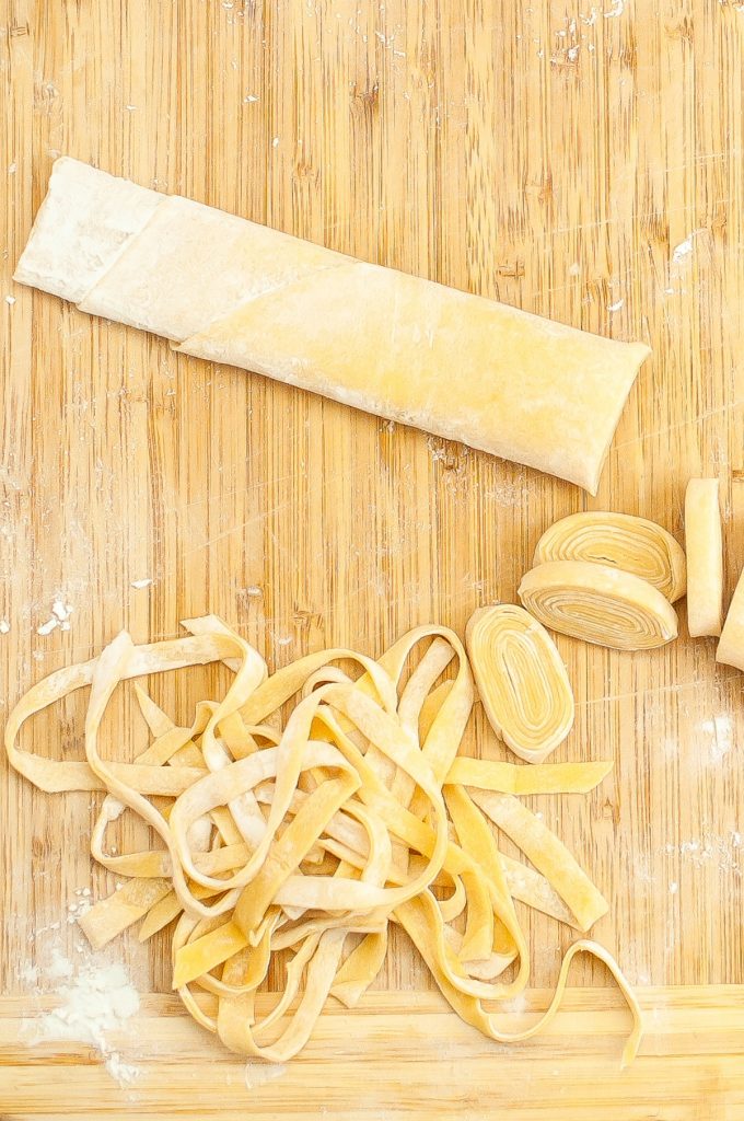 Rolled homemade pasta and sliced. 