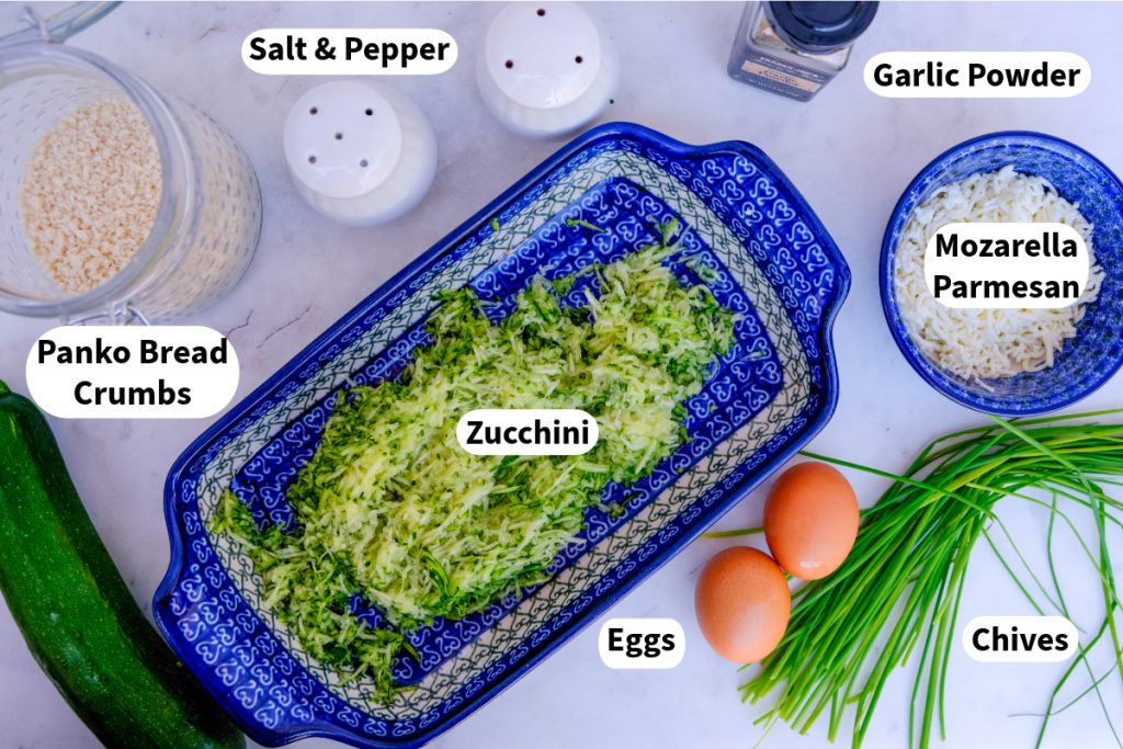 Ingredients needed to make zucchini fritters.