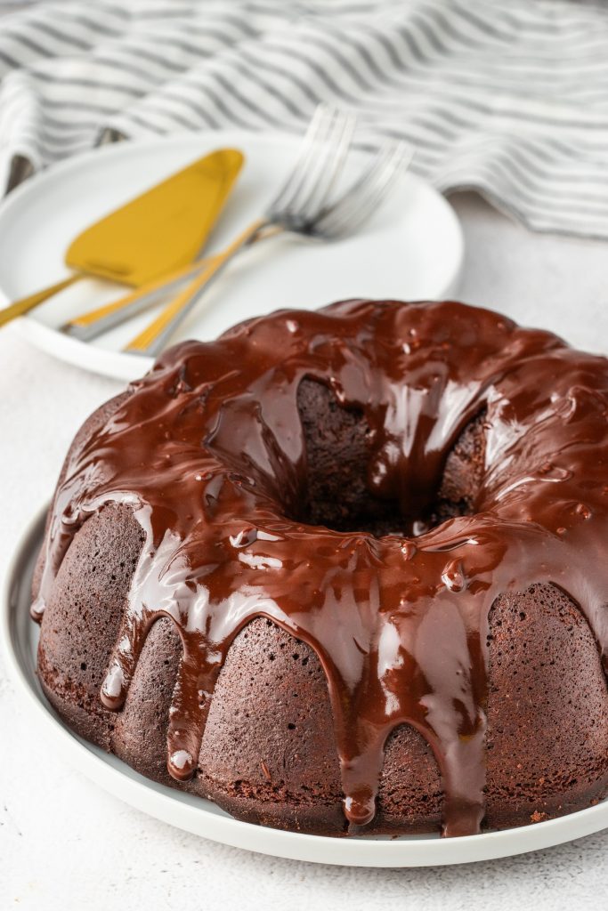 Chocolate bundt cake on topped with chocolate ganache. 