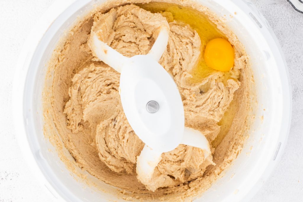 Wet ingredients in a mixing bowl for a homemade cake. 