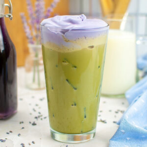 Copycat Starbucks lavender matcha latte recipe in a clear glass.