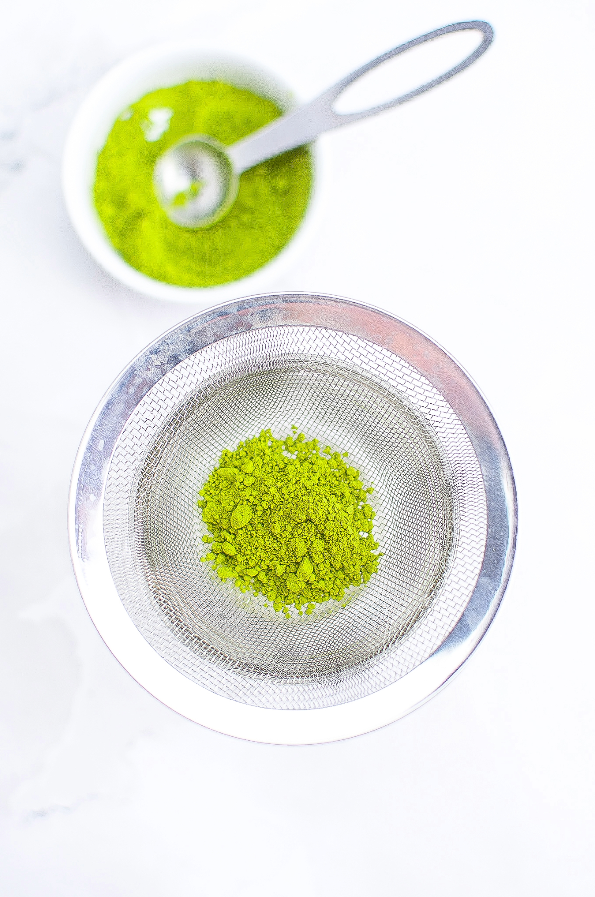 Matcha sifted in a small bowl. 