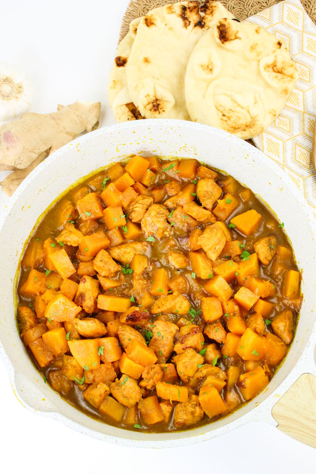 Pumpkin chicken curry in a bowl.